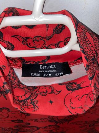 Top manga larga dragones rojo