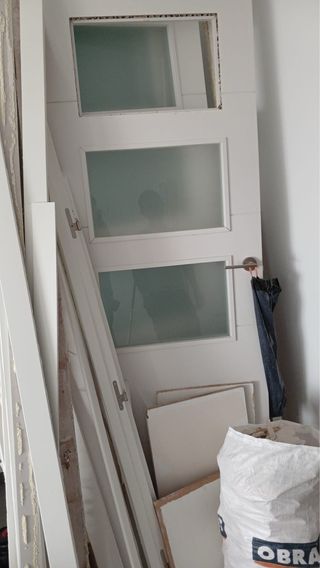 Puerta de paso con vidriera