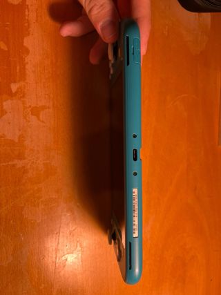 Nintendo Switch Lite con funda y 2 juegos