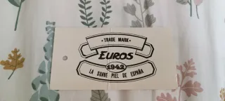 Chaqueta de piel negra con forro estampado