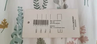 Chaqueta de piel negra con forro estampado