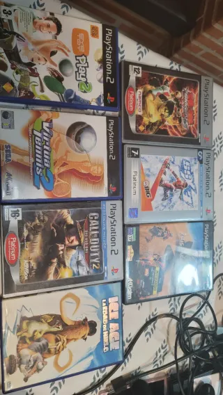 Playstation 2 con 2 mandos y tarjeta