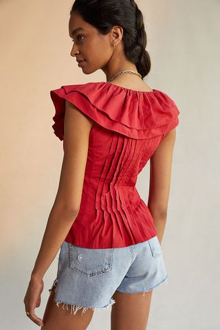 Blusa top rojo con volante de Anthropologie, XS