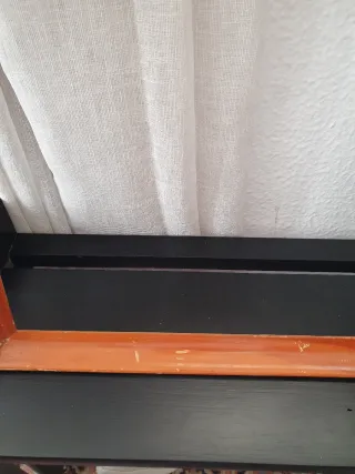 Cornice in legno marrone