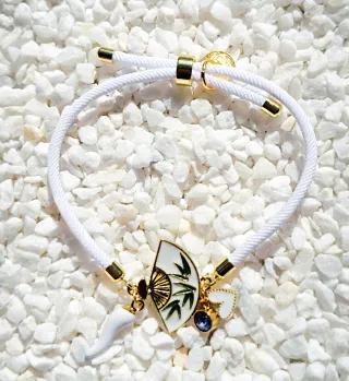 Pulsera abanico rosa y dorada