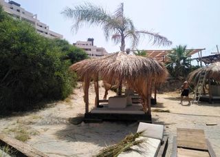 Pergole e ombrelloni in erica su misura