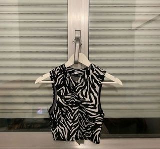 Top cebra sin mangas escote redondo