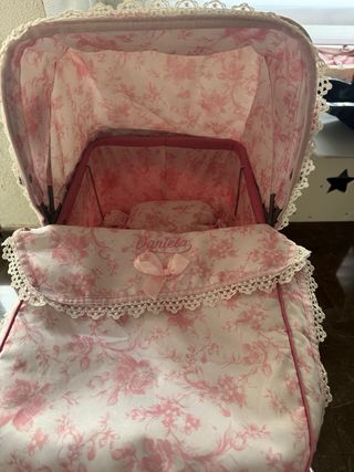 Cochecito de muñecas rosa