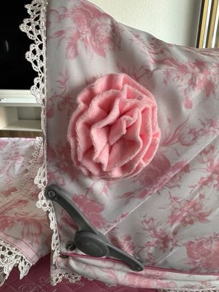Cochecito de muñecas rosa
