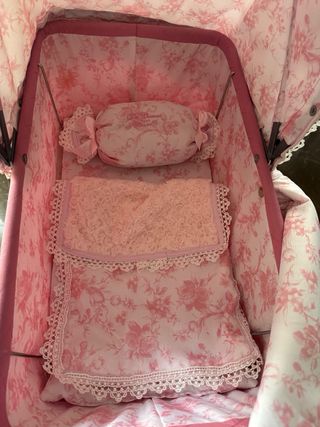 Cochecito de muñecas rosa