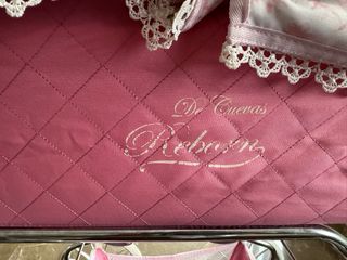 Cochecito de muñecas rosa