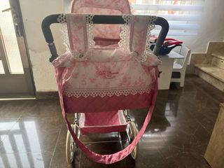 Cochecito de muñecas rosa