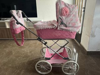 Cochecito de muñecas rosa