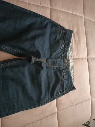 Jeans con risvolto blu