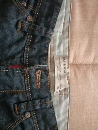 Jeans con risvolto blu