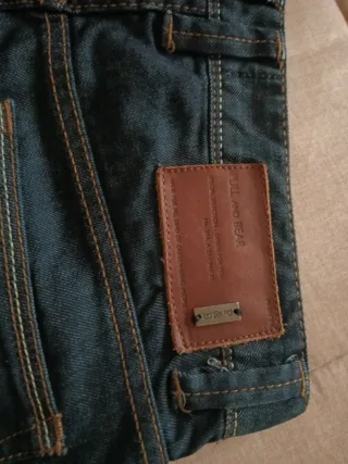 Jeans con risvolto blu