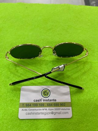 Gafas de sol ovaladas doradas y verdes
