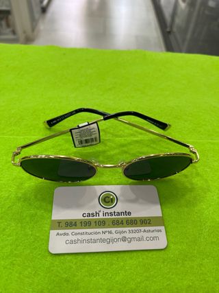 Gafas de sol ovaladas doradas y verdes