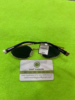 Gafas de sol ovaladas doradas y verdes