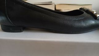 Ballerine nere con fiocco borchiato