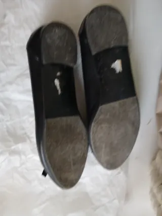 Ballerine nere con fiocco borchiato