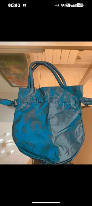 Bolso de mano bordado floral