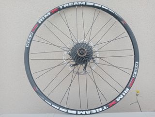 rueda 12V,QR10 26 trasera,disco,centrada recta,