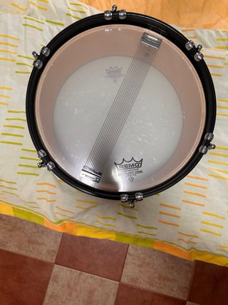 Tambor REMO 31cm + Baquetas + Caja