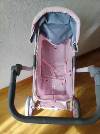 Carrito de muñecas rosa y gris
