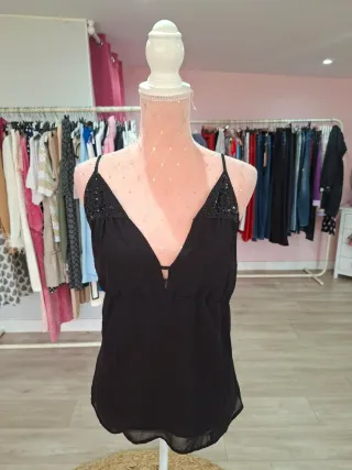 Top negro con lentejuelas