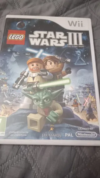 Nintendo Wii + 2 mandos + 2 volantes + 9 juegos