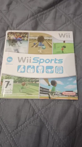Nintendo Wii + 2 mandos + 2 volantes + 9 juegos