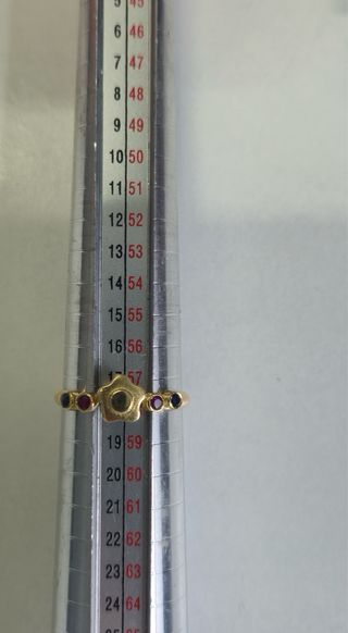 Anillo oro 18k flor central piedras