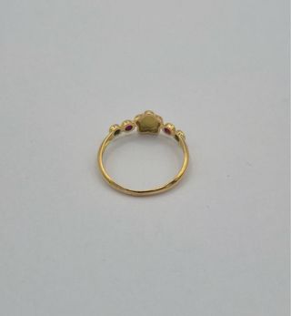 Anillo oro 18k flor central piedras