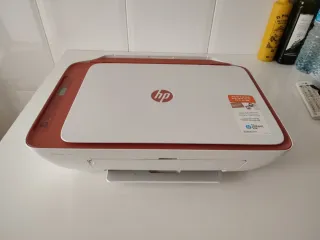 Impresora HP Multifunción Naranja y Blanca