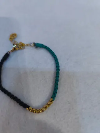 Pulsera chica nueva negra y turquesa.
