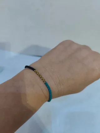 Pulsera chica nueva negra y turquesa.