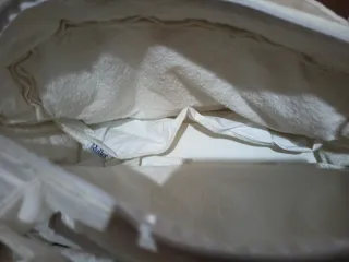 Canastilla con bolsa maternidad, saco y cambiador