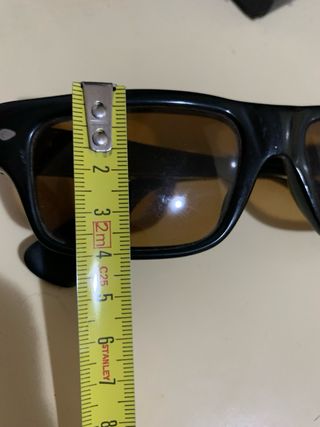 Occhiali da sole Persol neri e marroni