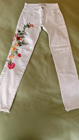 Pantalones vaqueros y short  talla 38.