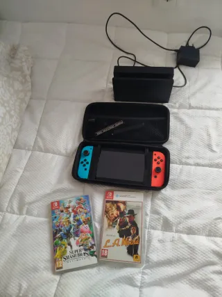 Nintendo Switch con funda y 3 juegos