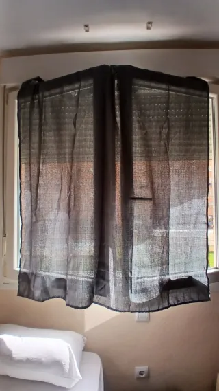 Cortinas grises con ojales