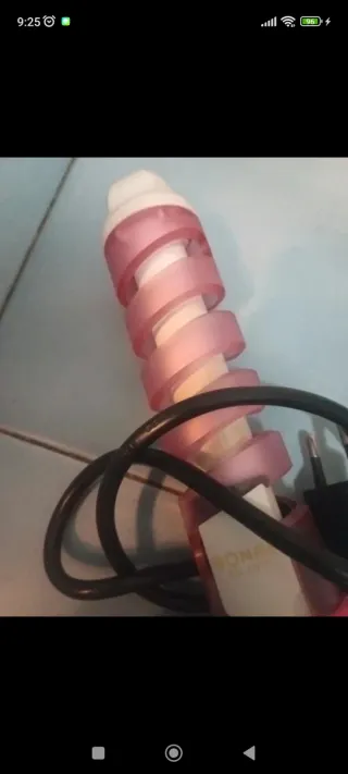 Arricciacapelli a spirale rosa