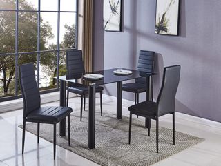 Mesa de cristal y 4 sillas negras