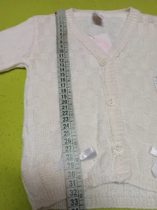 Casaco de malha branco com laços 6 a 12 meses