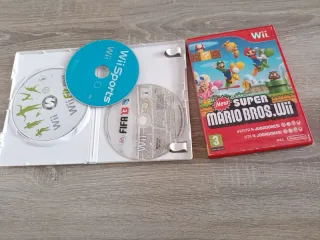 Nintendo Wii + Wii Fit + Juegos