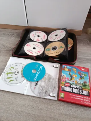 Nintendo Wii + Wii Fit + Juegos