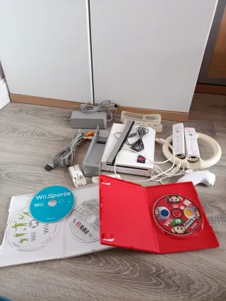 Nintendo Wii + Wii Fit + Juegos