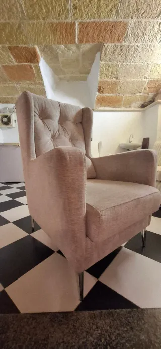 Sillon de tela gris