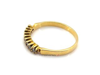 anillo oro 18k con piedra con diamante